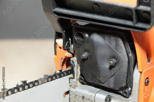 Chainsaw exhaust silencer closeup - gardenpower tools equipment storage