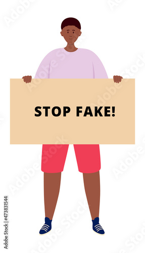 Guy holding stop fake banner. Man protesting against lie in social media