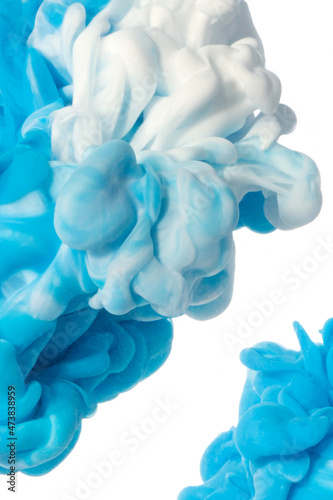 White with blue light gentle pastel background, abstraction macro photography ink in water