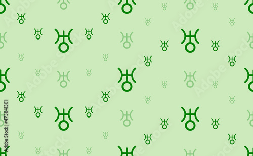 Seamless pattern of large and small green astrological uranus symbols. The elements are arranged in a wavy. Vector illustration on light green background