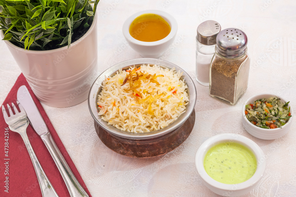 Pilaf, pulaw or pulau is a traditional way of cooking rice, with vegetables, lamb or beef, chicken or sometimes fish, and with spicy seasonings. Pilaf, pulaw or pulau is a traditional way of cooking rice, with vegetables, lamb or beef, chicken or sometimes fish, and with spicy seasonings.