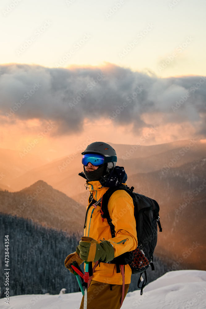 great view of the of ski athlete against the backdrop of mountains and sky great view of the of ski athlete against the backdrop of mountains and sky