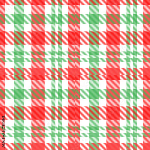 Chirstmas plaid pattern. Colorful tartan plaid pattern. Multicolor check plaid in white, green and red for fabric and textile design.