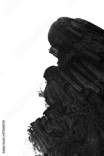 Black brush strokes on white paper isolated. Black brush strokes oil paints on white paper. Isolated on white background. Abstract creative white black background