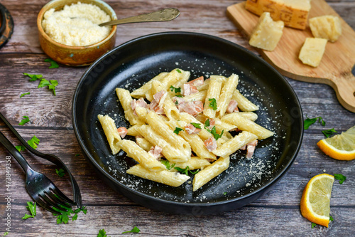  Fresh home made italian penne pasta alla carbonara with cream sauce , bacon,egg, parmesan cheese ,olive oil and black pepper) 