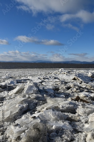 Snow on the banks of the river, Montmagny, Québec, Canada