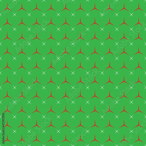 Red stars and white stars pattern on green background. 