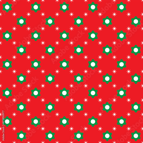 Green flowers and white dots on red background. Christmas color pattern. 