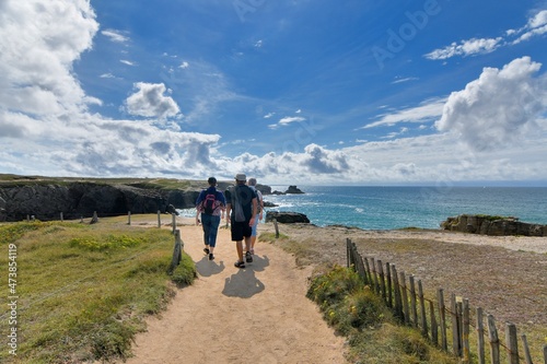 Obraz na płótnie People,walking along the wild coast at the Quiberion peninsula in Brittany Franc