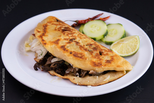 Gordita with meat and cheese