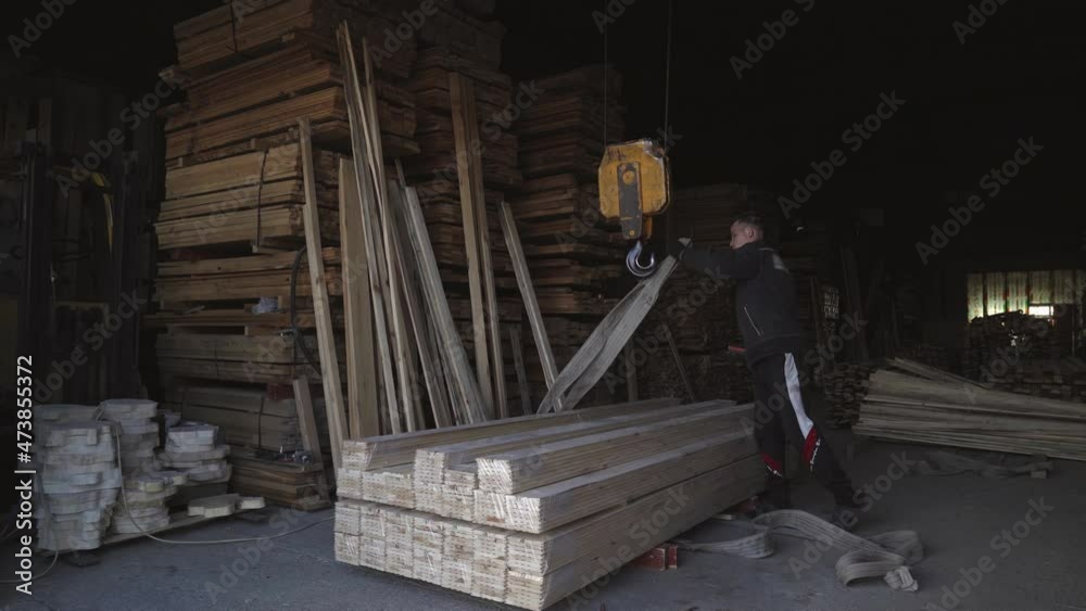 Worker Unattaches Wooden Boards Finished Production Stack From Lifting ...