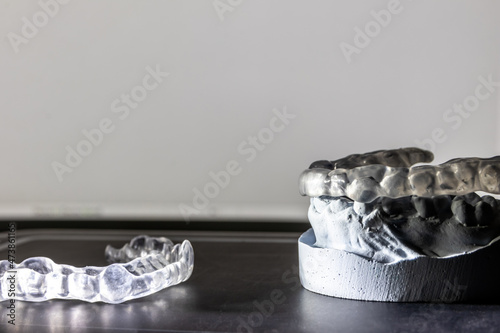 Dental splint against bruxism and grinding teeth with teeth imprint and dental healthcare of an orthodontist as dental protection in a medical dentistry is important to keep the teeth healthy