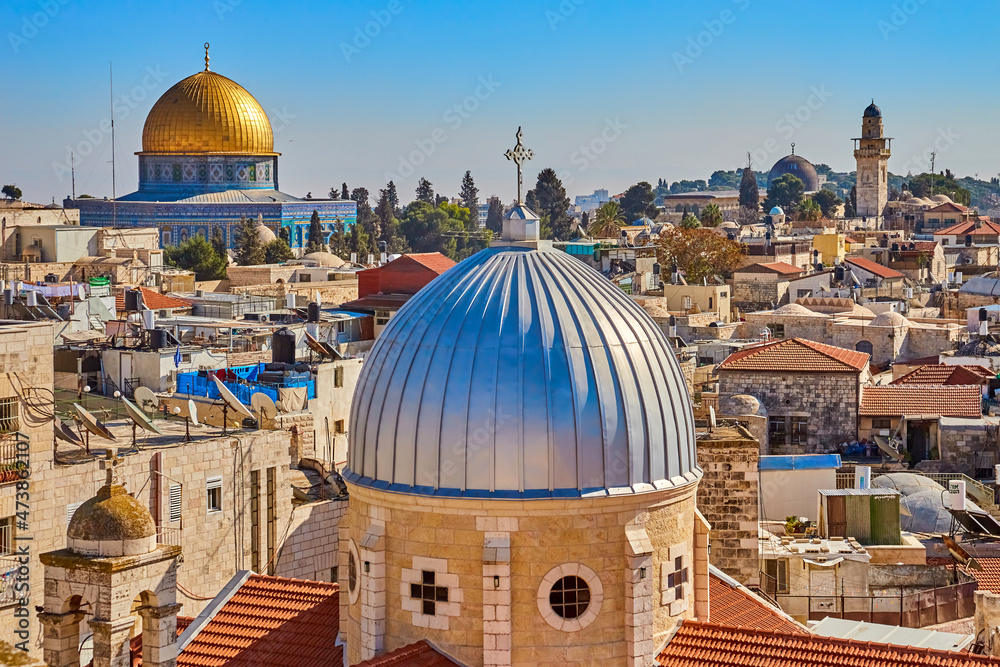 Panoramic view of Dome of Armenian Church of Our Lady of Spasm and Dome of Rock, Temple Mount, and ancient rooftops of old city of Jerusalem, Israel from roof Austrian Hospice of Holy Family