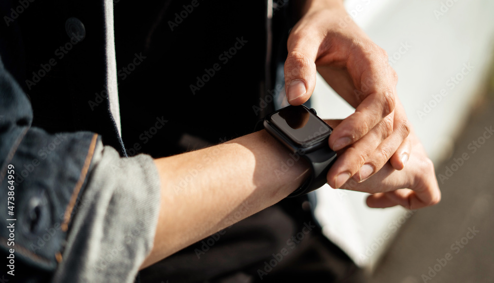 Smart watches on a man's hand