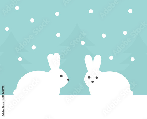Cute bunnies in winter scenery.