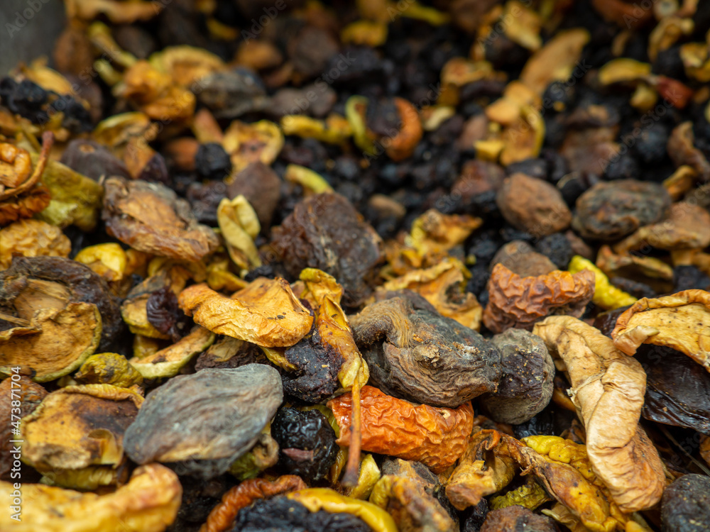 Background from dried fruits. Lots of dried fruits. Diet. Filling for compote.