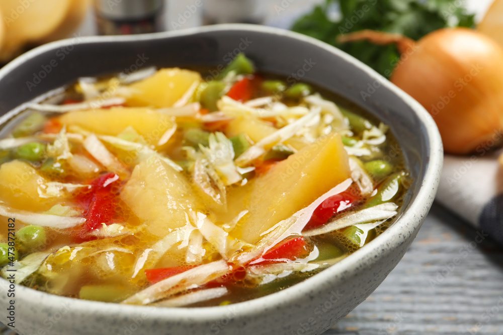 Bowl of delicious turnip soup on grey table, closeup Bowl of delicious turnip soup on grey table, closeup