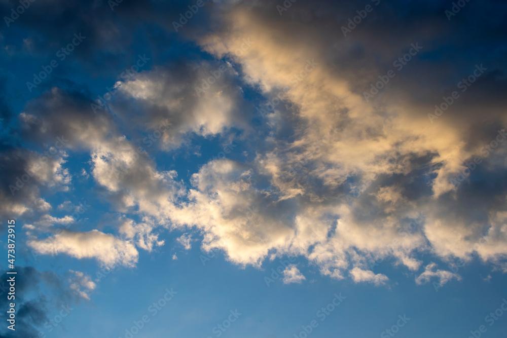 Scattered clouds in the blue sky, sunset in rural area of Guatemala