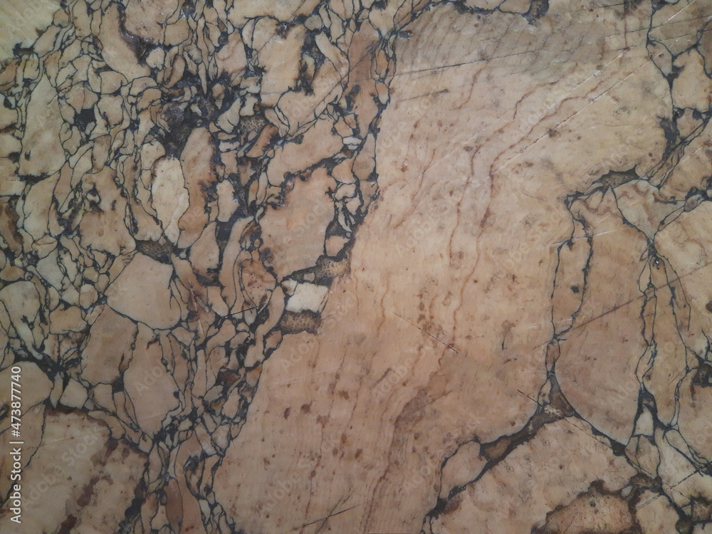 Fototapeta premium Old brown marble surface stained all over the frame