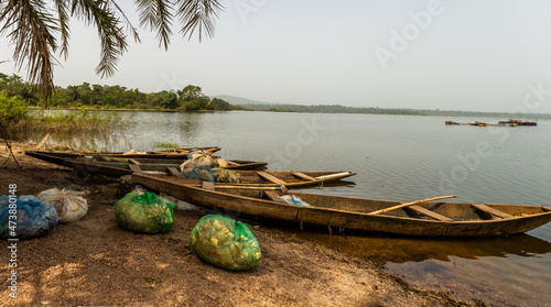 Fishing boats at Okinni Dam and water reserves, Located near Osogbo in the Egbedore Local Government area of Osun State, Nigeria. A major source of water supply for the area. photo