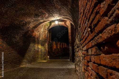 Medieval Passage to the old Castelvecchio Bridge over the Adige River at Night, Verona
