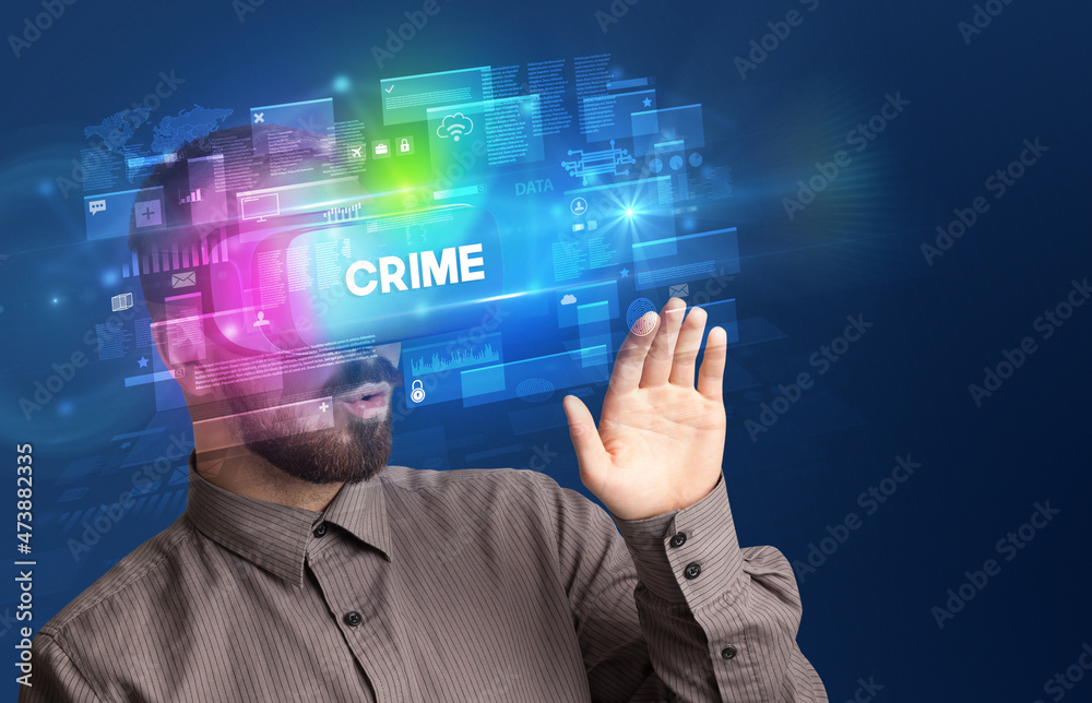 Businessman looking through Virtual Reality glasses Businessman looking through Virtual Reality glasses