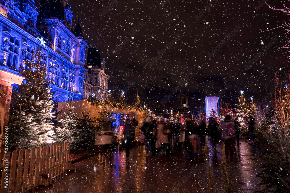 Magical Christmas market spirit in Paris, France. Celebrating new years eve. Happy holidays.