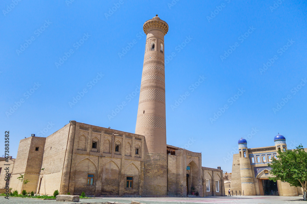 Historical landmarks of Dishan-Kala (historical 'outer city'), Khiva, Uzbekistan. Said Niyaz Sheliker Mosque and Palvan-Darvaza Gate. Both buildings were built at beginning of 19th century