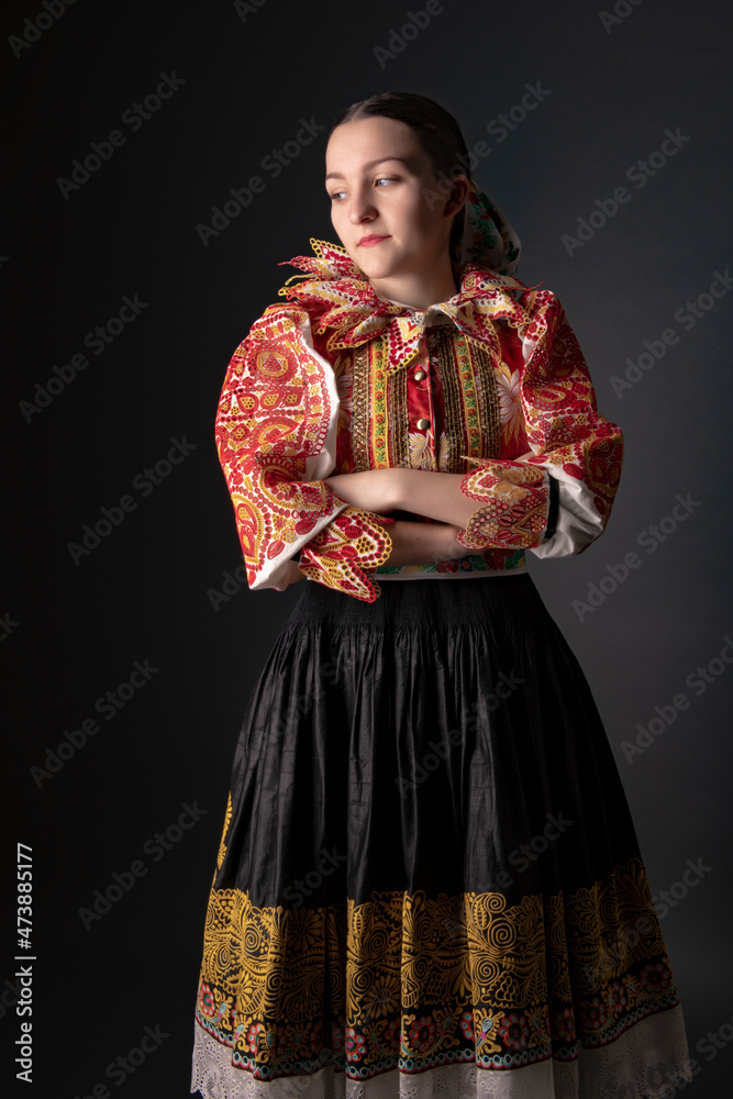 Young beautiful slovak woman in traditional dress. Slovak folklore Young beautiful slovak woman in traditional dress. Slovak folklore