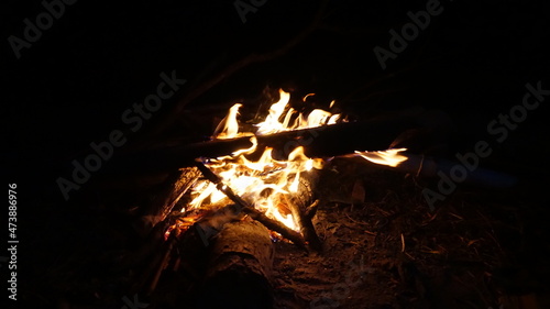 A bright bonfire provides heat and warmth in winter.