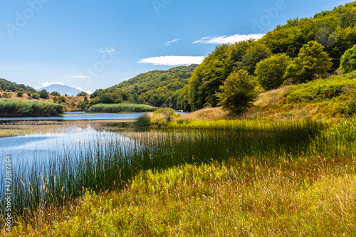 View of Biviere lake with Etna volcano  Nebrodi National Park  Sicily  Italy