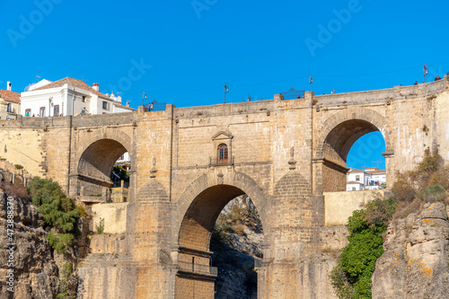 Panoramic view of the canyon  old town and bridge in the medieval city of Ronda  Spain  in the Southern Andalusia region. 
