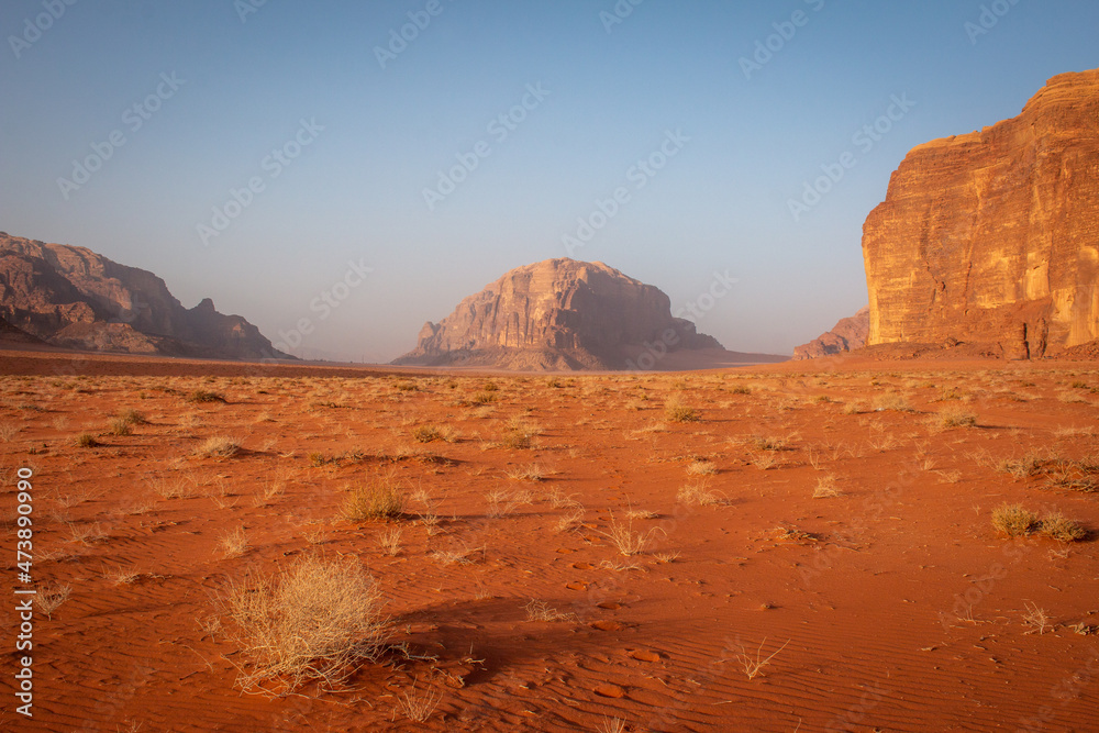 Hiking in Wadi Rum desert at sunset, April, Jordan