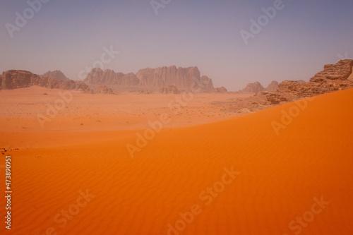 Bright orange dunes in Wadi Rum desert, Jordan