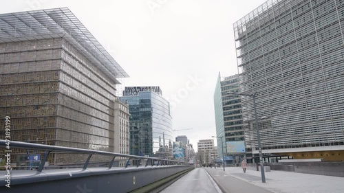 Almost no one in the European quarter due to the coronavirus in Brussels, Belgium. Skyline with the European Commission on the right, Europa building on the left photo