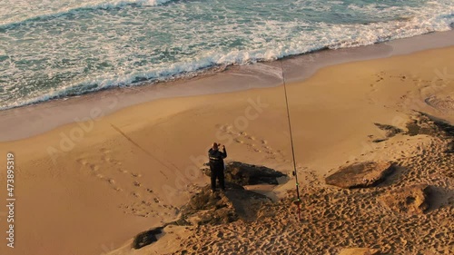 serfcasting at sea, sport fishing, grafting bait photo