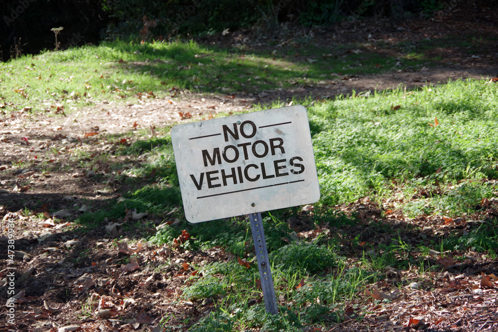 Sign posted at a public nature parkway NO MOTOR VEHICLES Sign posted at a public nature parkway NO MOTOR VEHICLES