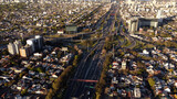 Aerial top down view of vehicular traffic on modern multilevel interstate overpass in Buenos Aires. Argentina. South America.