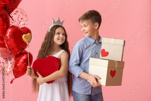 Happy children with gifts a...