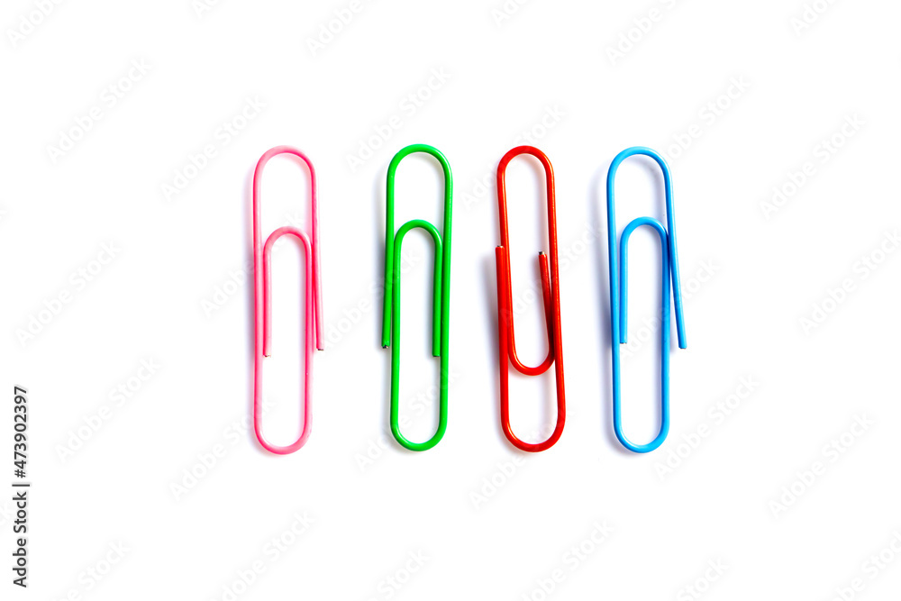 olorful paper clips on white background with copy space. olorful paper clips on white background with copy space.