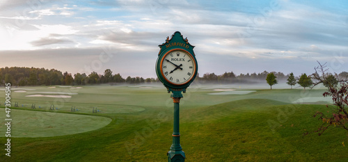 Aerial golf course images of scenic golf holes.