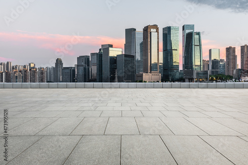 Panoramic skyline and modern commercial office buildings with empty road. empty square floors and cityscape. © ABCDstock