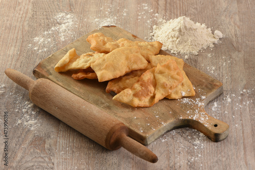 Puff pastry, flakes on a cutting board, traditional food in colombia south america