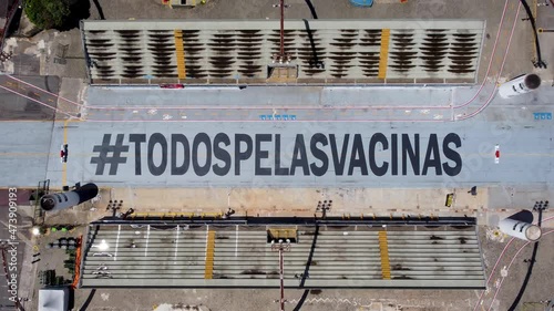 Aerial landscape of carnival sambadrome in Sao Paulo empty due coronavirus lockdown. Protest for vaccination. Coronavirus vaccination campaign All For Vaccines in portuguese at Anhembi Sambadrome photo