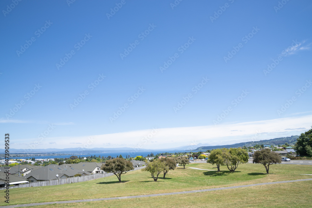 View from scenic outlook over Taupo, the lake and to distant mountains