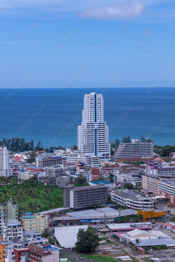 Fototapeta premium view of Patong and patong beach with the buildings and high-rise hotels and resorts in the background Kathu phuket Thailand
