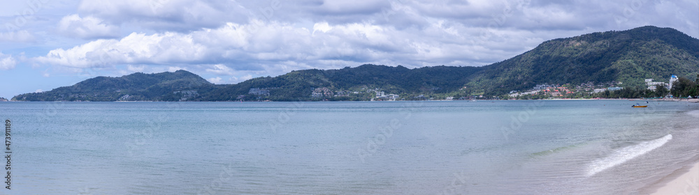 view of Patong and patong beach with the buildings and high-rise hotels and resorts in the background Kathu phuket Thailand 