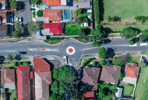 Panoramic Aerial Drone view of Suburban Sydney housing, roof tops, the streets and the parks NSW Australia