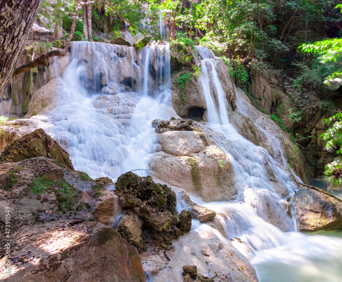Erawan waterfalls in the national park mountains of Kanchanaburi BKK Bangkok Thailand lovely turquoise blue creamy waters lush green trees smooth rock formations