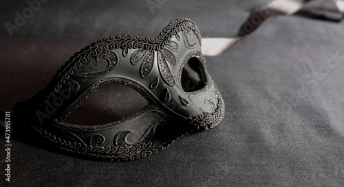 Tableau sur toile Carnival Venetian black mask on dark grey color background, female disguise, mas